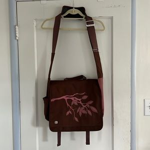 Brown and pink messenger bag